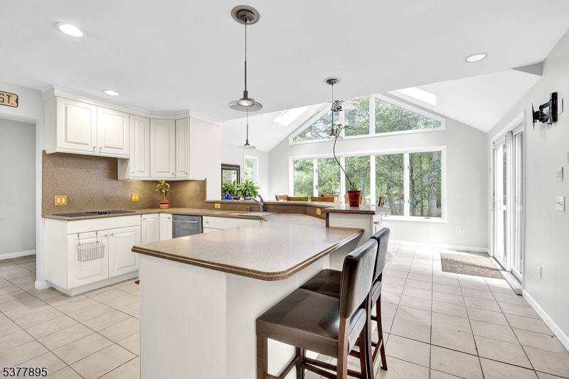 Welcome to this charming ranch home, perfectly situated to take advantage of its desirable open space setting and peaceful surroundings.