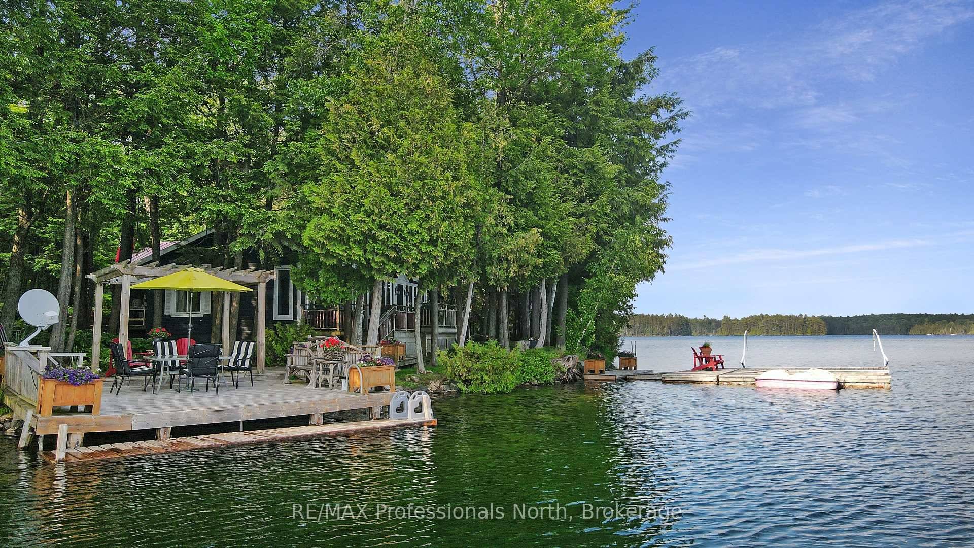 Dont miss your chance to own this private slice of paradise, on the crystal clear, limestone bottom shores of Salmon Lakea rare gem offering exceptional privacy and unbeatable lifestyle potential.