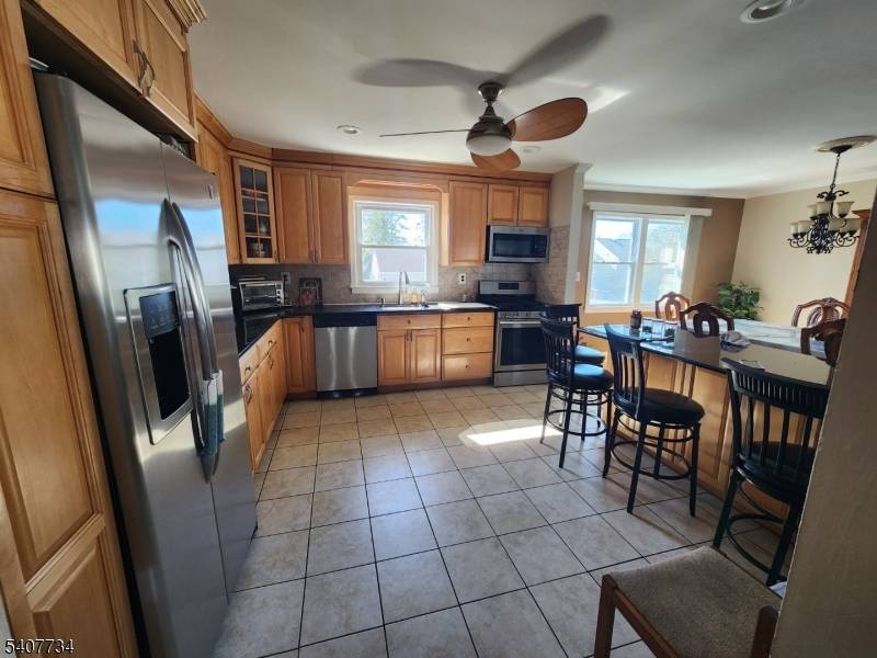 Beautifully upgraded to modern look in cozy setting, a Bilevel One Family home in most convenient location of the Edison Township.