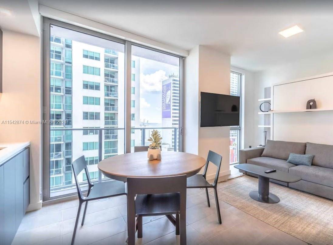 Experience the epitome of urban living in this chic studio apartment located in the heart of Downtown Miami.