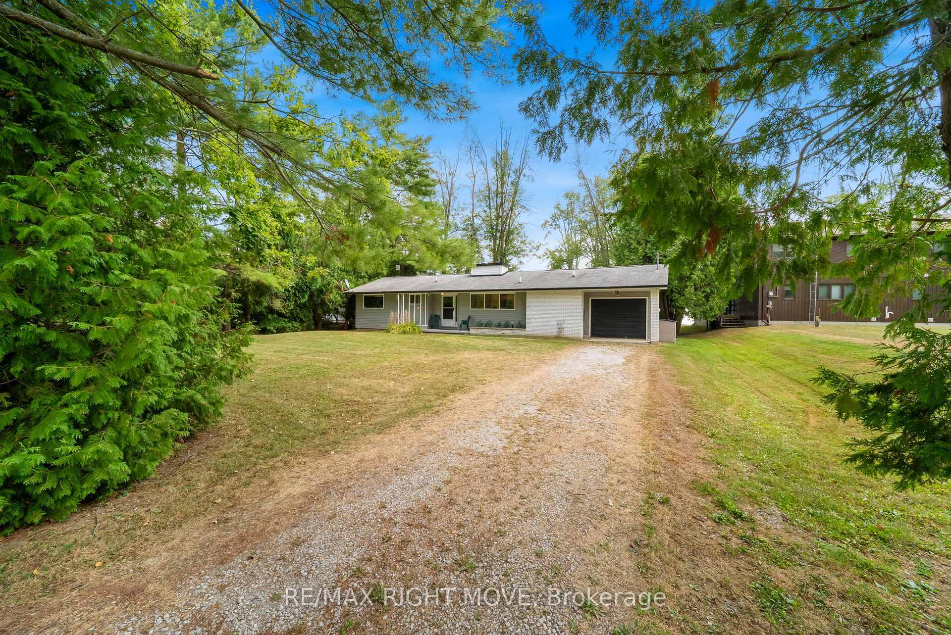 Discover the charm of waterfront living on Lake Couchiching with this well maintained bungalow set on a deep 65x220 foot lot, offering 65 feet of waterfront.