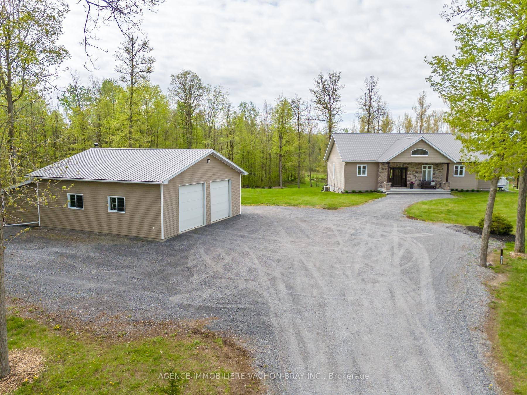 Apple Hill ! Nestled on a sprawling 66 acre private, treed lot, this stunny property offers the ultimate tranquility.