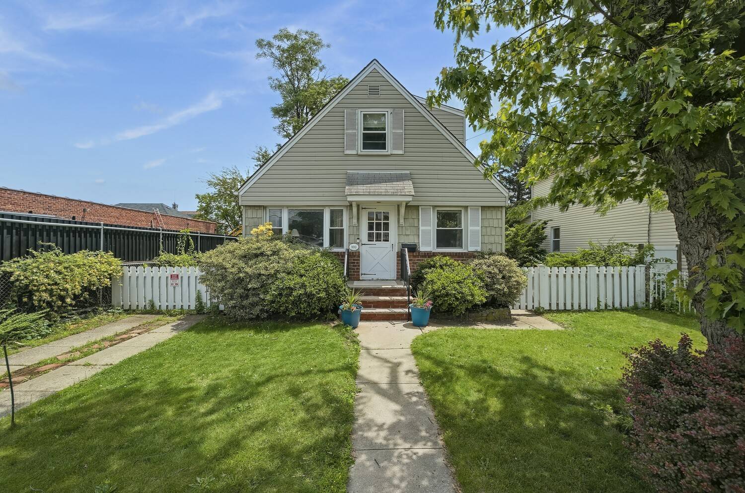 Cozy Cape with Endless Possibilities on a Sprawling Lot in Queens Village !