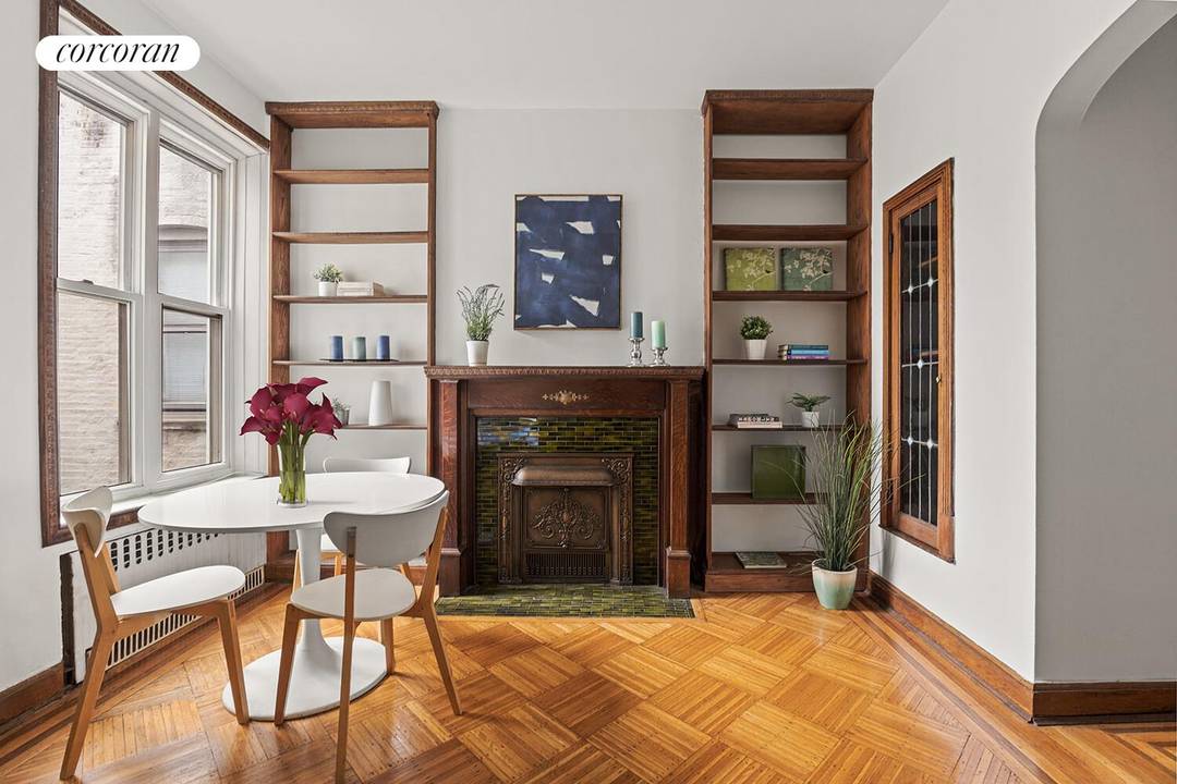 TOP FLOOR CHARMER ! This ideally located pre war 1 bed home office has so much to offer original parquet floors, a windowed kitchen, 9'4 tall ceilings, a gorgeous decorative ...