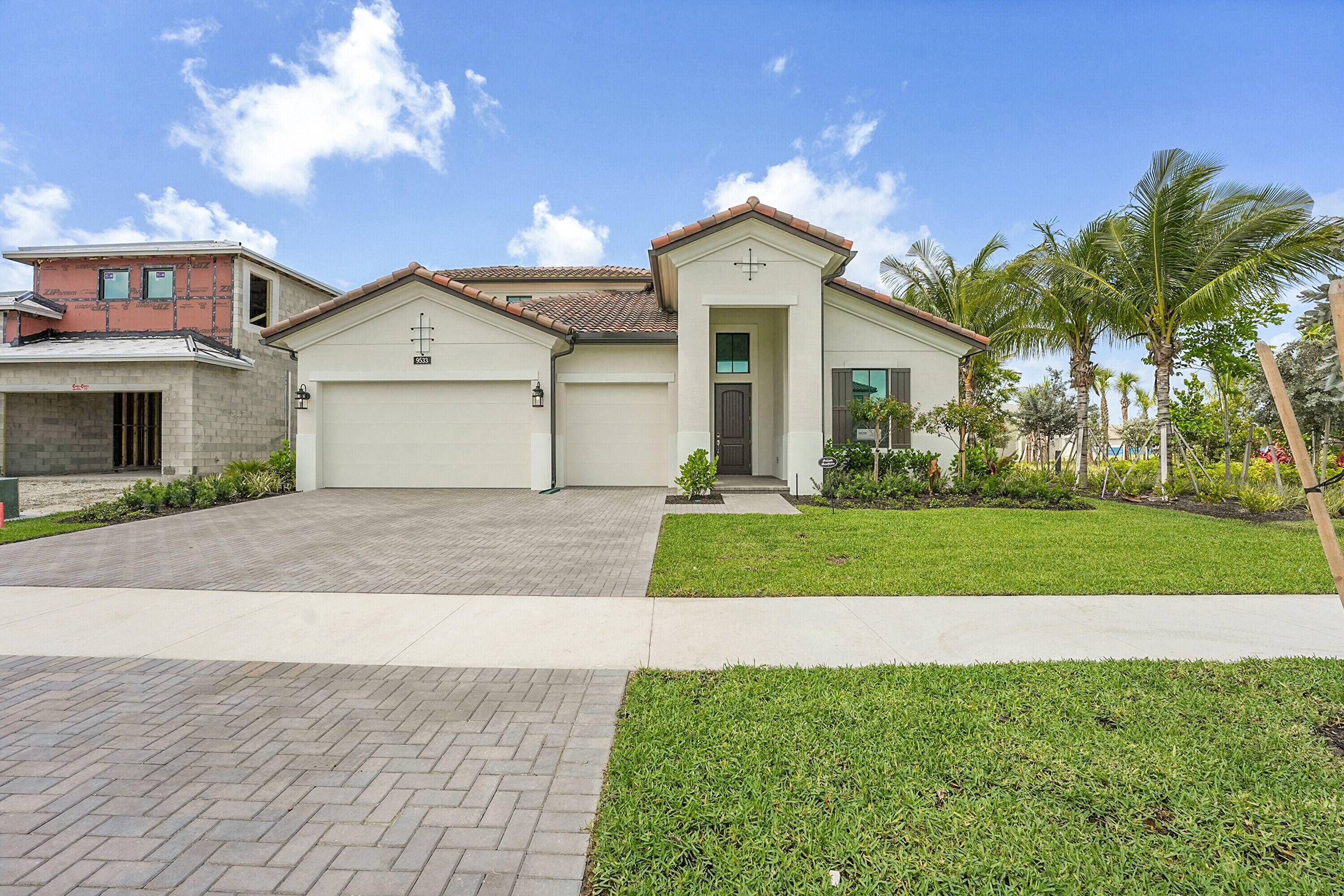 The Paige floorplan, with a pool, is located within the gated community of L'Ambiance at Avenir.