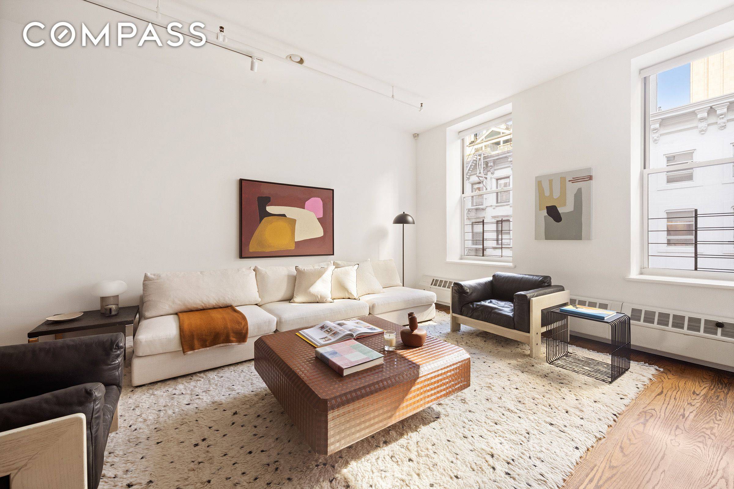 3 Bedroom Condo Loft in the Heart of Tribeca This spacious and beautifully designed loft offers generous living and dining areas framed by oversized windows and abundant natural light.