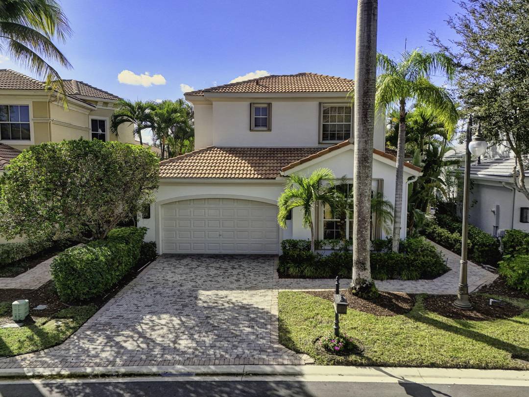 Now is the perfect time to settle into this beautifully updated four bedroom, three and a half bath residence located in the prestigious The Country Club at Mirasol.