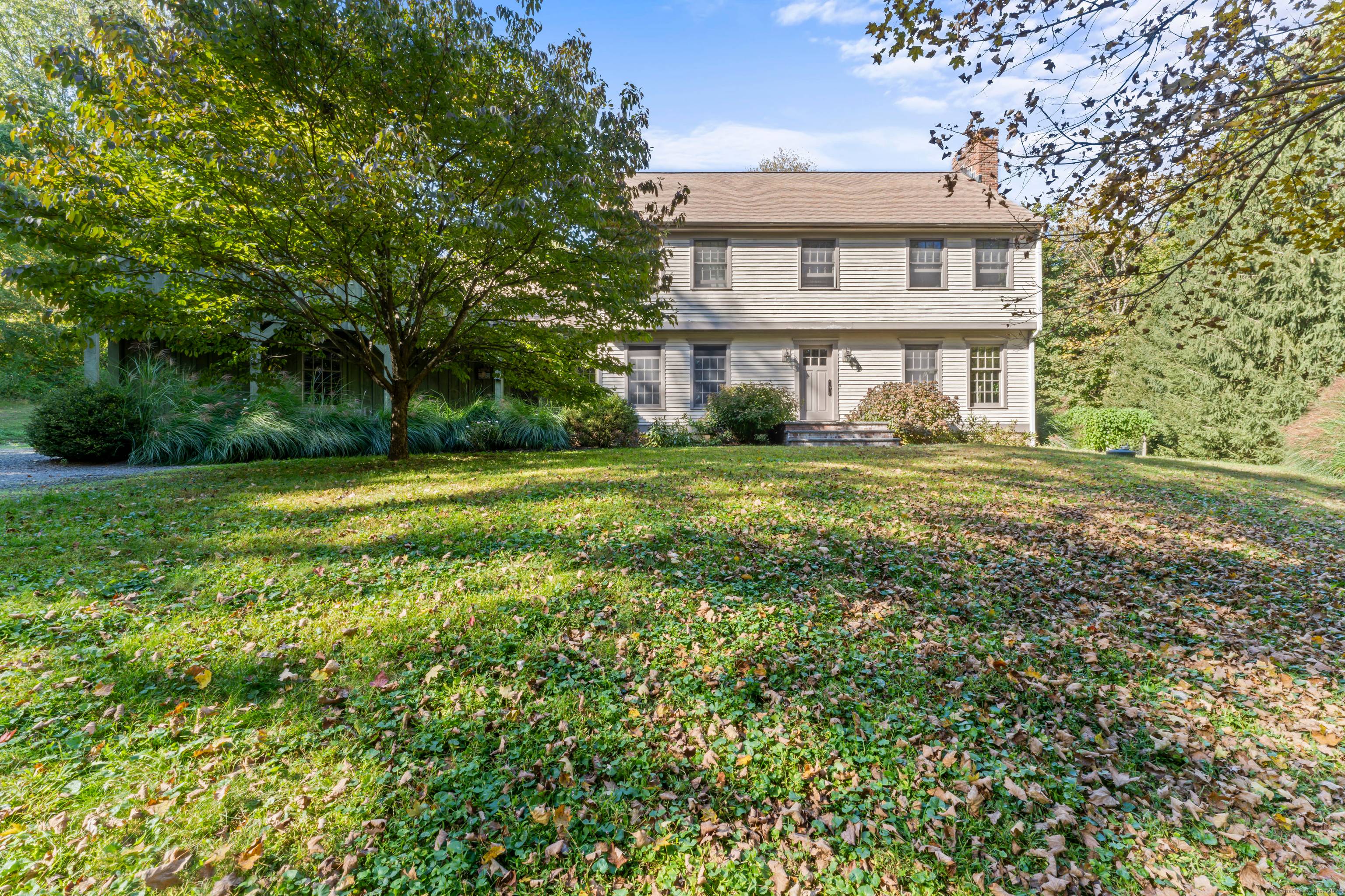This Ox Hill custom colonial sits on a peaceful 2 acre setting.
