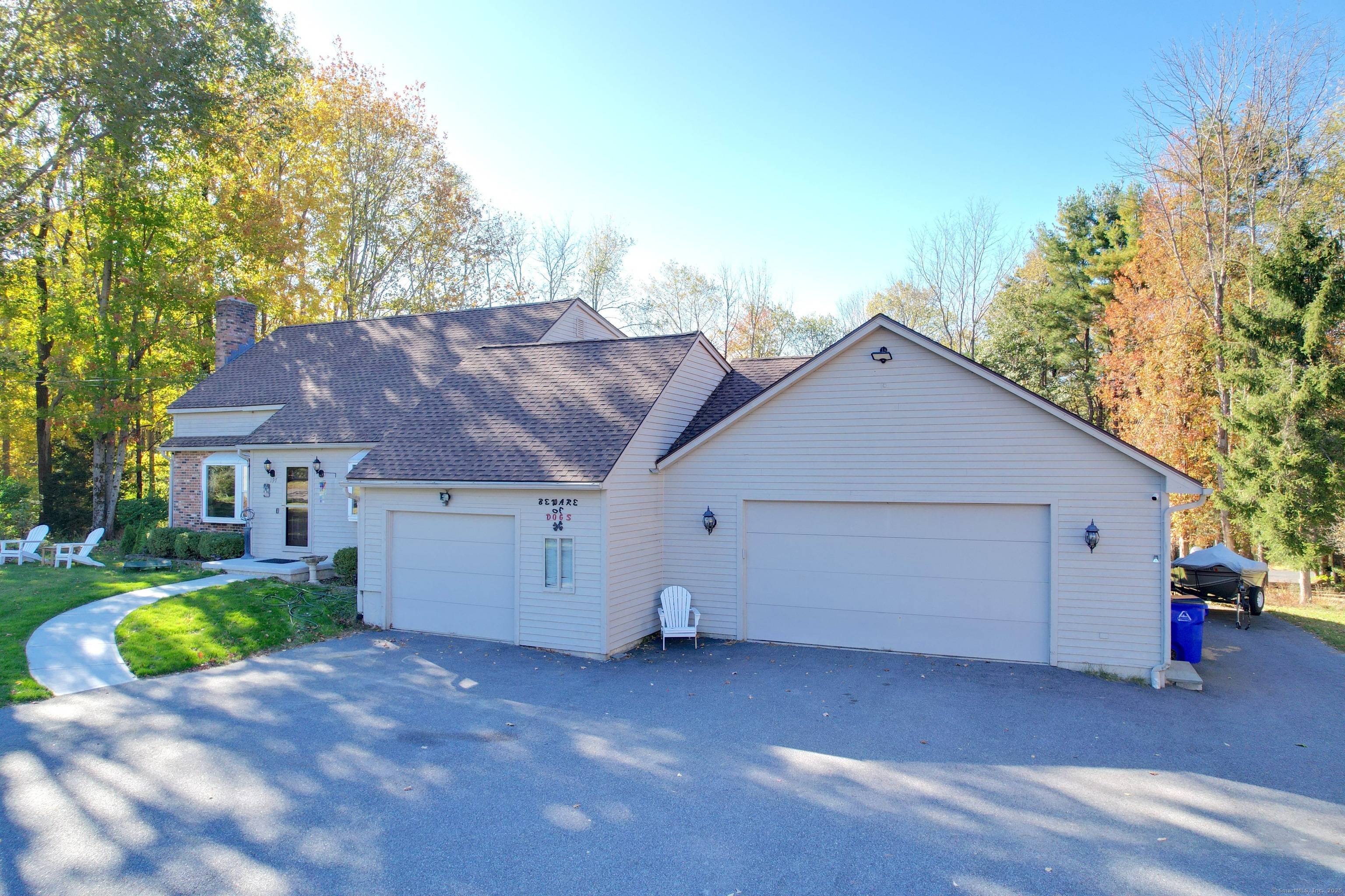 Discover the charm of this spacious contemporary Cape, set on a peaceful one acre lot in a desirable rural neighborhood.