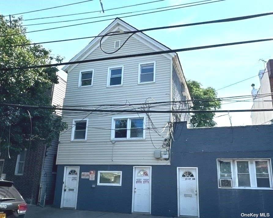 Colonial Style Home. This Home Features 3 Bedrooms, 3 Full Baths, 2 Eat In Kitchens and Full Basement.
