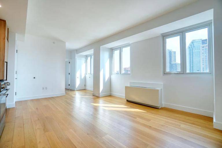 1 Bedroom PENTHOUSE in the Heart of Long Island CityWelcome to your sun drenched sanctuary in the sky a spacious and beautifully designed 1 bedroom, 1 bathroom penthouse located in ...