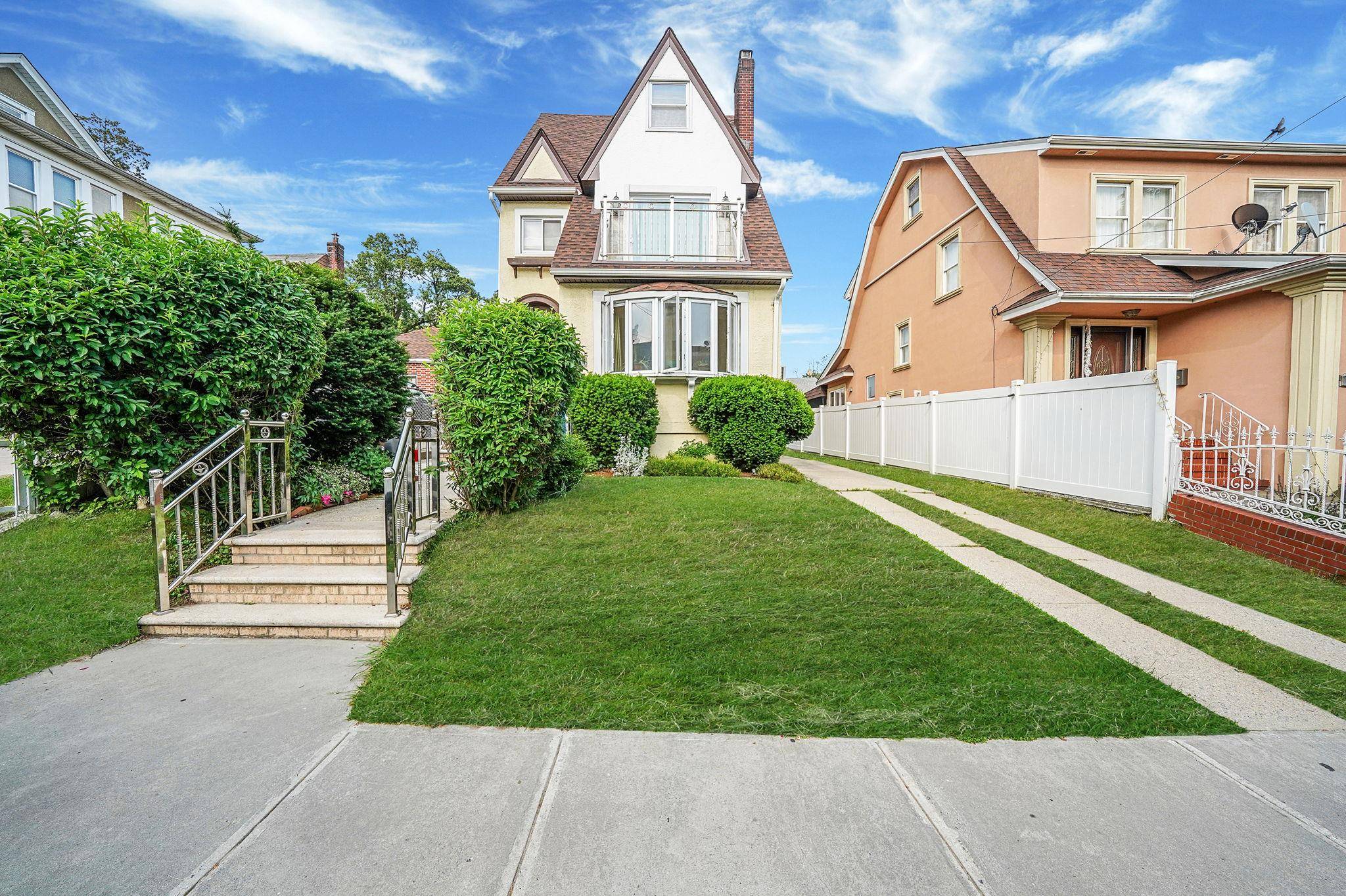 Welcome to this beautiful two family colonial home legally converted from one family house.