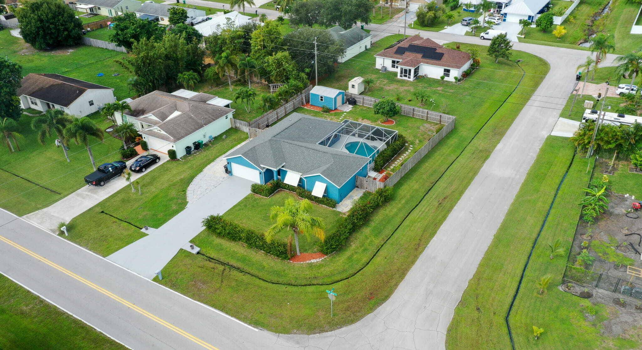 Beautifully Upgraded 3BR 2BA POOL Home on a CORNER Lot, NO HOA with ALL IMPACT Windows for a Peace of Mind !