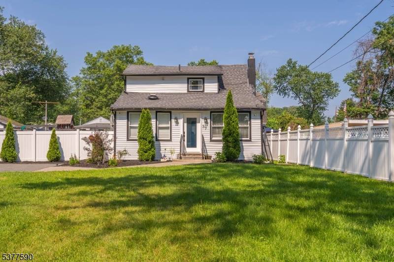 Welcome Home ! Fall in love with this charming Cape Cod style single family home offering 3 inviting bedrooms and 2 beautifully appointed full bathrooms.