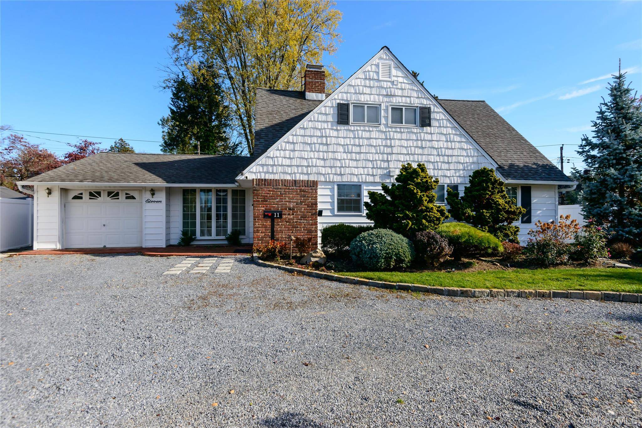 Sun flooded Cape cod style home in East Meadow Schools !