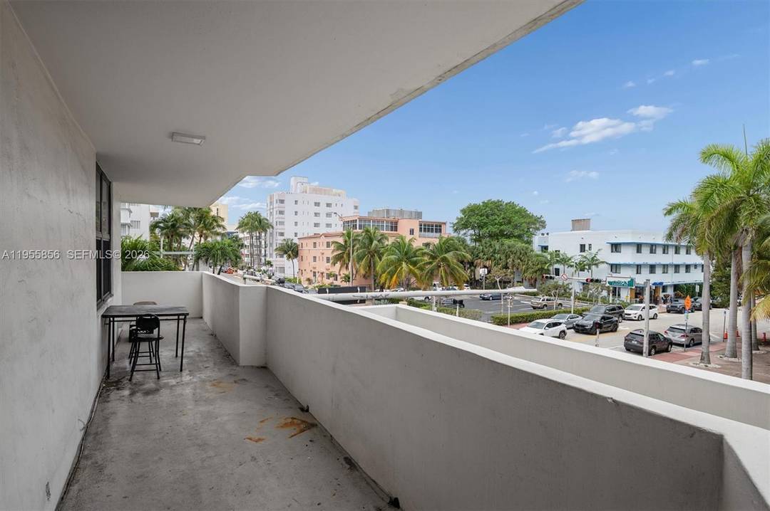 Spacious two bedroom, two bath, oceanfront building, corner unit with wrap around balcony views toward the ocean and the city.