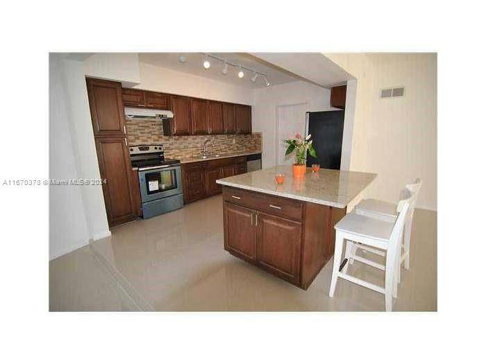 3 2 pool home in the quaint North Miami neighborhood.
