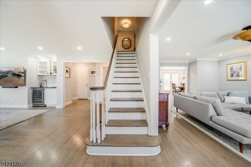 Set on a quiet street in Short Hills, this 4 bedroom office, 5.