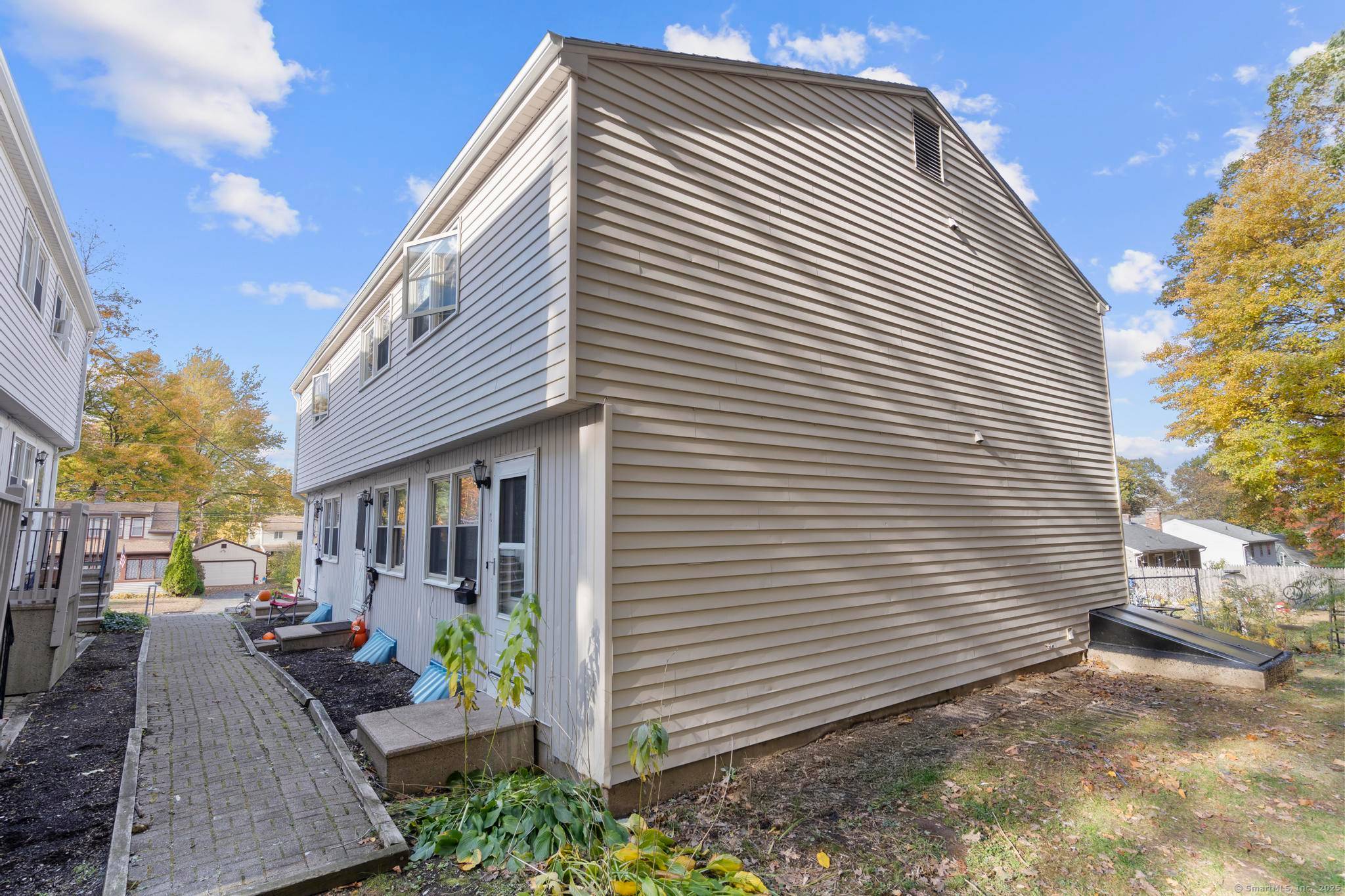 Beautifully maintained three family property in Bristol featuring three spacious side by side townhouse style units.