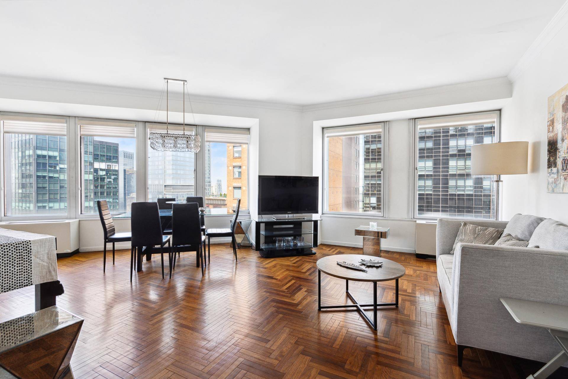 Experience breathtaking views from this stunning condominium located on a high floor, boasting floor to ceiling windows that offer sweeping vistas of the North and West.