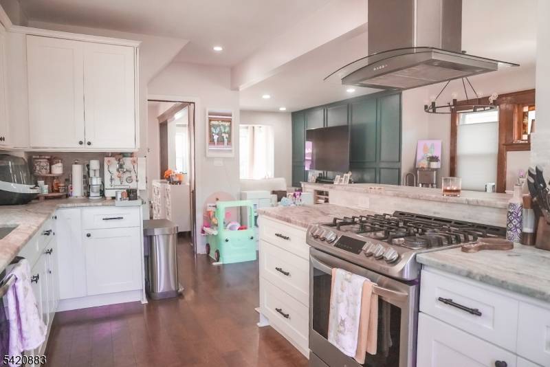 Welcome to this beautifully maintained 4 bedroom, 1.