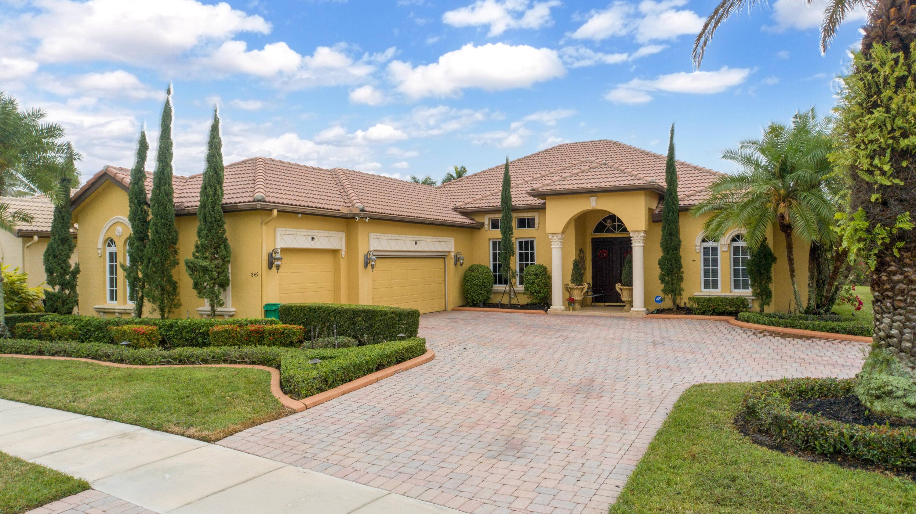Welcome to this luxurious 4 bedroom, 3 bathroom home PLUS an office, nestled in the highly sought after Vineyard community in Port St.