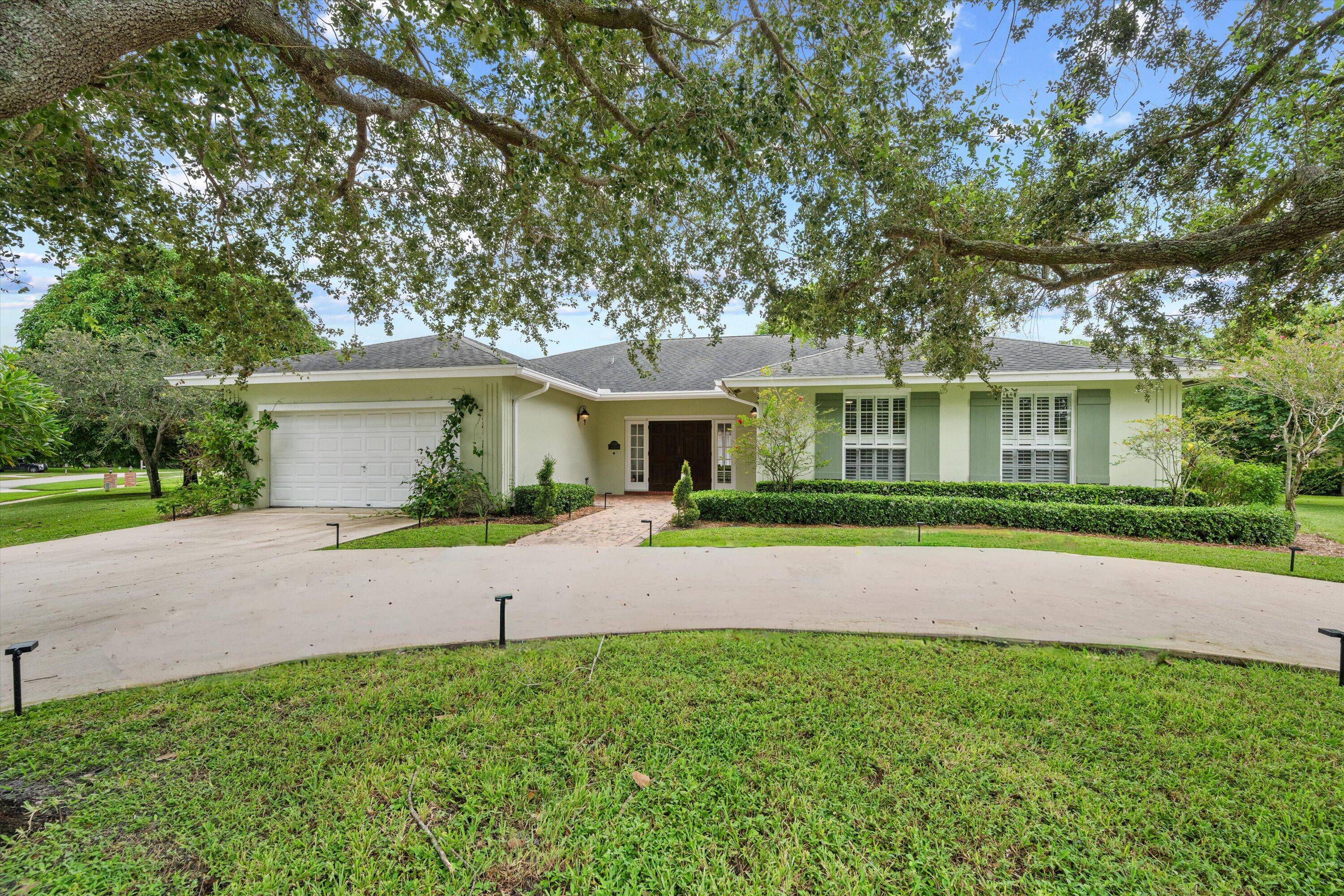 Charming 3 bedroom, 2. 5 bath home on a beautifully landscaped lot in a quiet, non HOA community just minutes from WEF and the Global Dressage Festival.