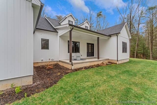 MOTIVATED SELLERS Nestled in Harwinton, Connecticut, this MODERN FARMHOUSE RANCH effortlessly combines privacy and craftsmanship.