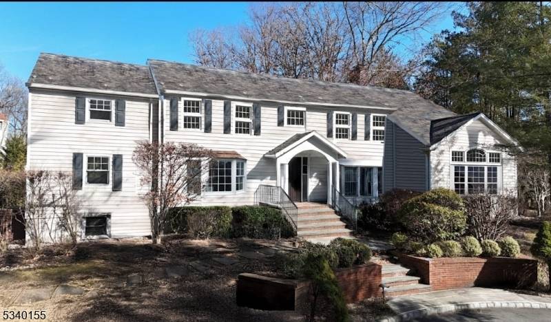 This exquisite Center Hall Colonial home with 5 bedrooms and 4.