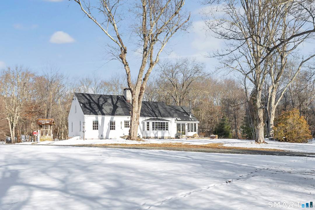 Tucked away in Norwalk's desirable Cranbury neighborhood, this fully renovated 3 bedroom, 2 full bath home sits on over 3 beautiful acres with a pond a rare and peaceful setting.