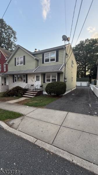 2 Family Home in Garfield with full finished basement.