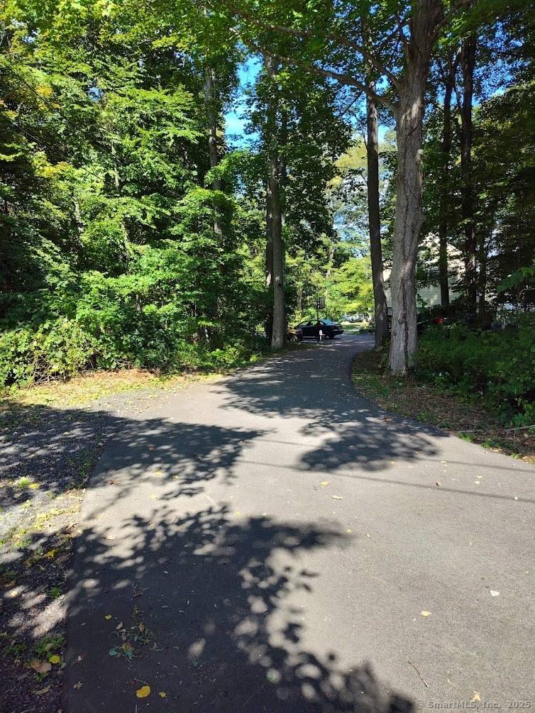Welcome into this bright voluminous Colonial, hidden away on its own sunny lot within a country casual community.