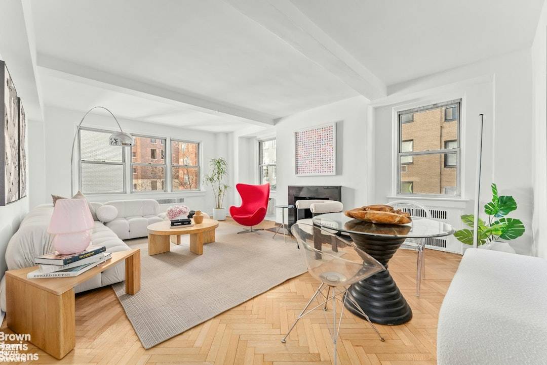 Just off Fifth Avenue, this distinguished Pre War corner residence combines timeless elegance with modern luxury.