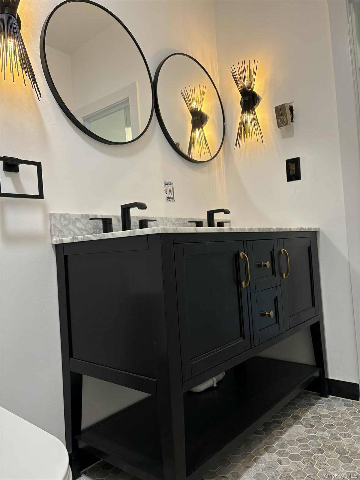 Welcome to 8 Roundtree, a modern, fully custom townhouse in the heart of Beacon perfectly designed for the discerning renter seeking refined style and comfort.