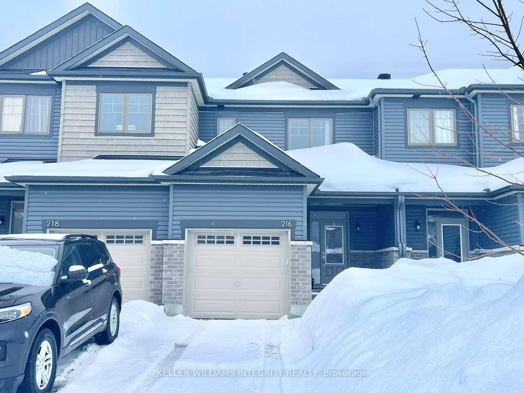 Step into this beautifully designed townhouse featuring an open concept living space that seamlessly connects the kitchen, dining, and living areas on the main floor.