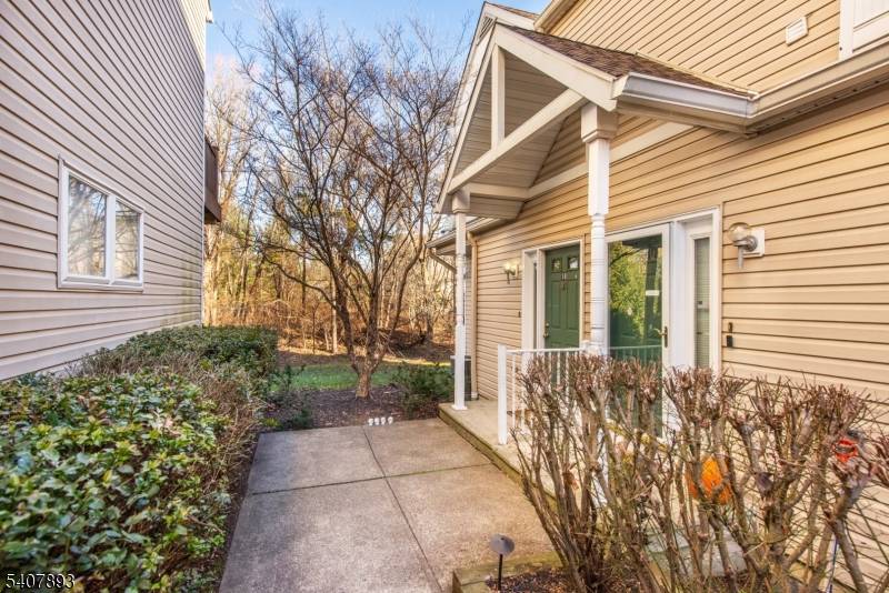 Discover the perfect blend of privacy and sunlight in this desirable end unit townhome, nestled in the serene, tree lined community of Hunting Meadow.