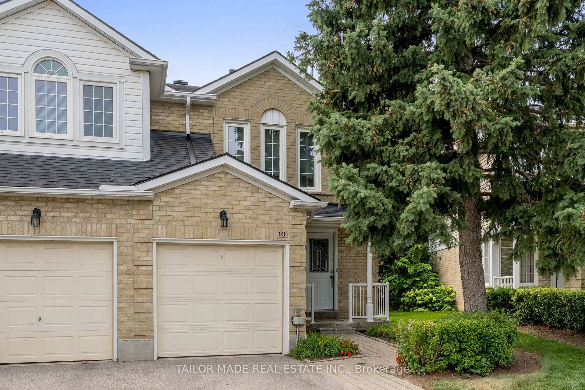 Welcome to this bright and spacious executive end unit townhouse that feels just like a semi !