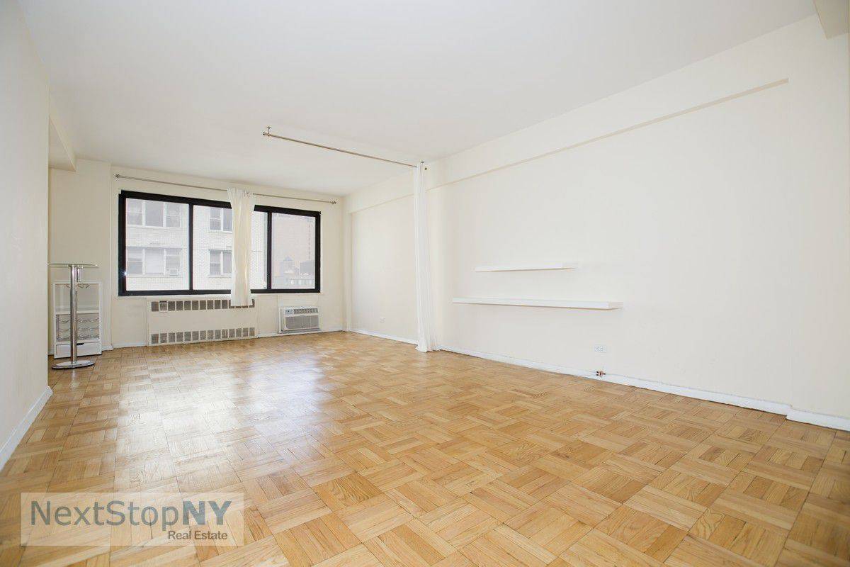 Sponsor Unit ! Tucked away in the bustling heart of Murray Hill, this well maintained studio offers an unmatched living experience bathed in natural light.