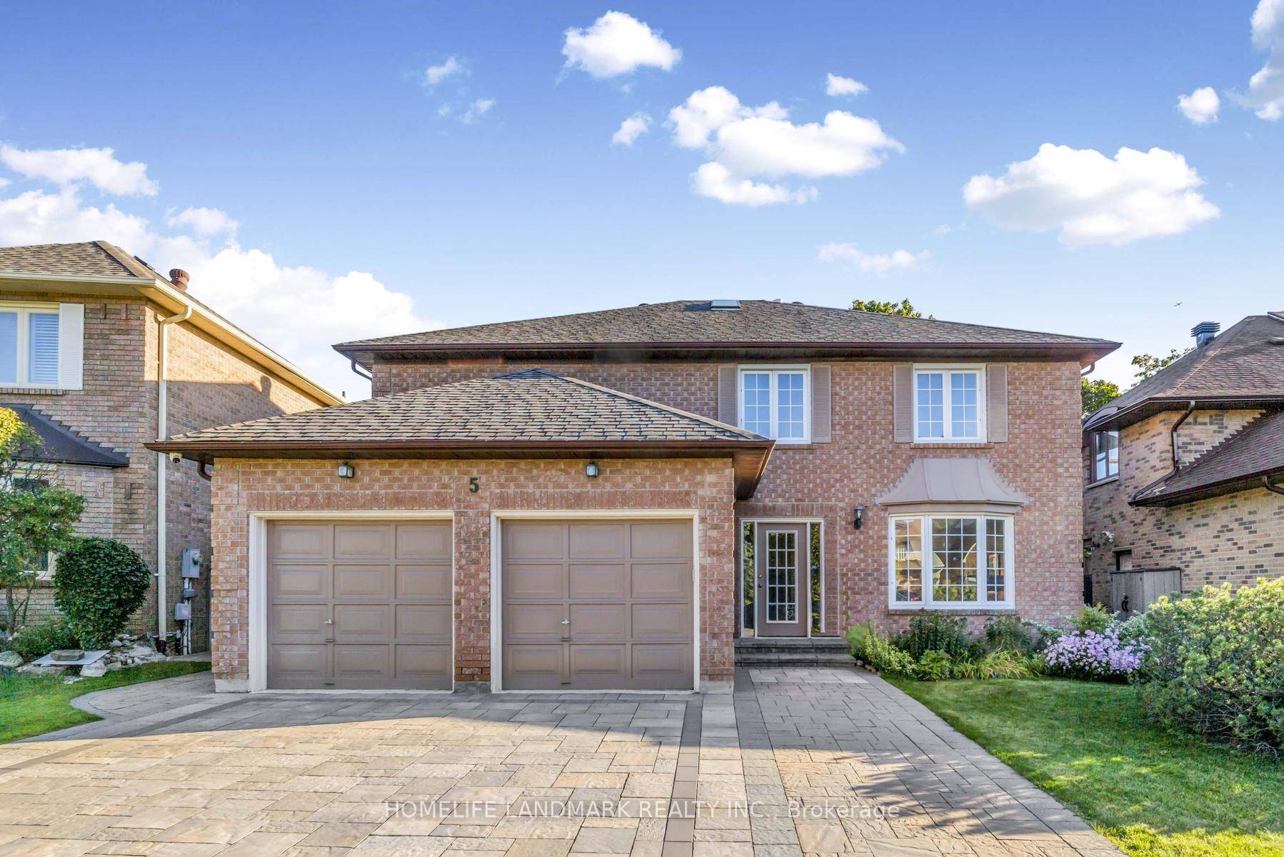 Bright and spacious detached 5 4 bedroom executive home with a double car garage, ideally situated in the prestigious Observatory community at Bayview and 16th Avenue.