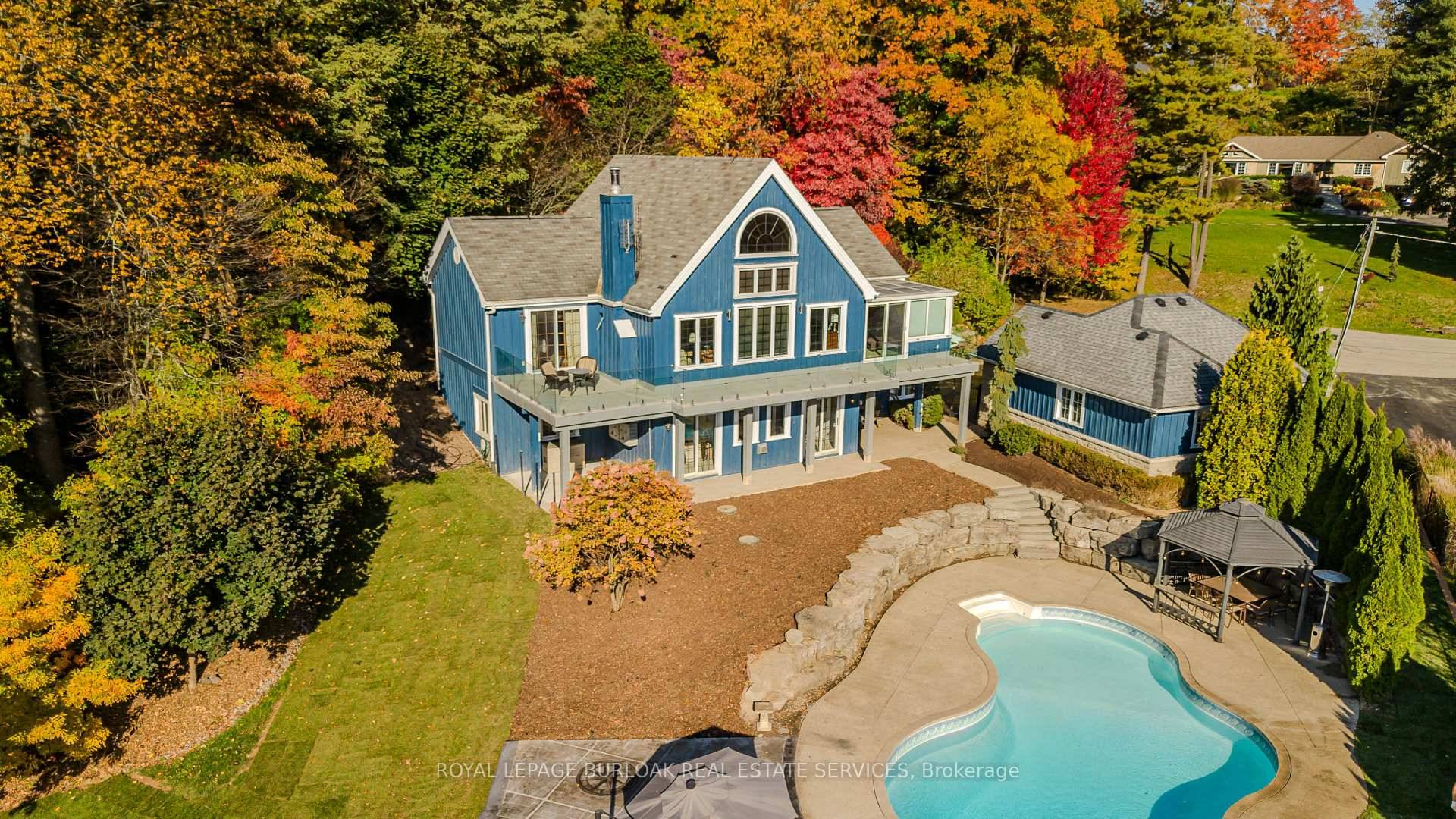 Nestled in the escarpment on historic Glenwood Heights, 172 Hillcrest Ave blends cottage serenity with urban ease, crafted by Normerica Timber Homes.
