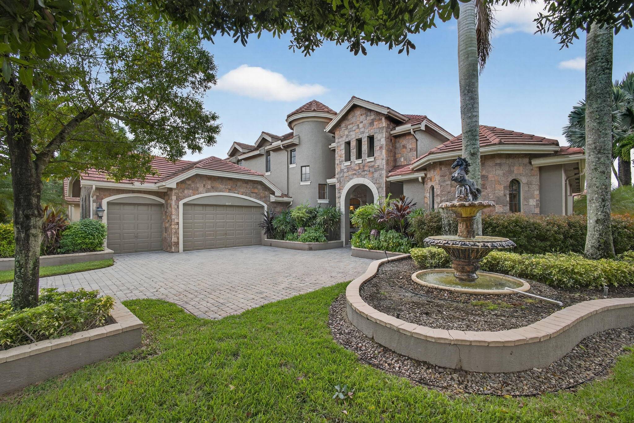 Lakefront luxury ! The moment you enter this exquisite estate, you are greeted by breathtaking views of the sparkling pool and tranquil lake through soaring windows that illuminate the formal ...
