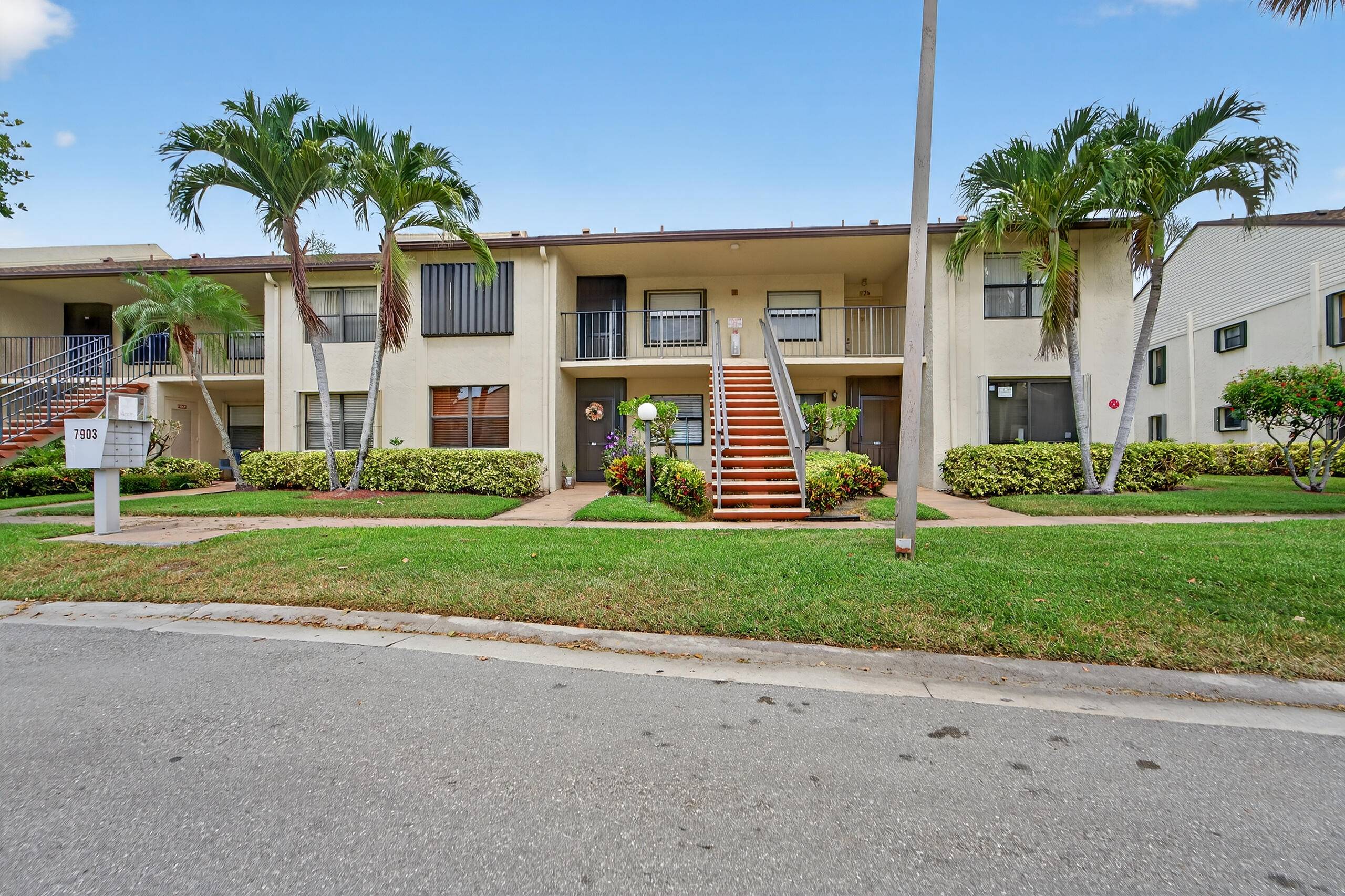 Spectacular 2 2 2nd floor condo with accordion shutters and large screened tiled patio with storage closet.