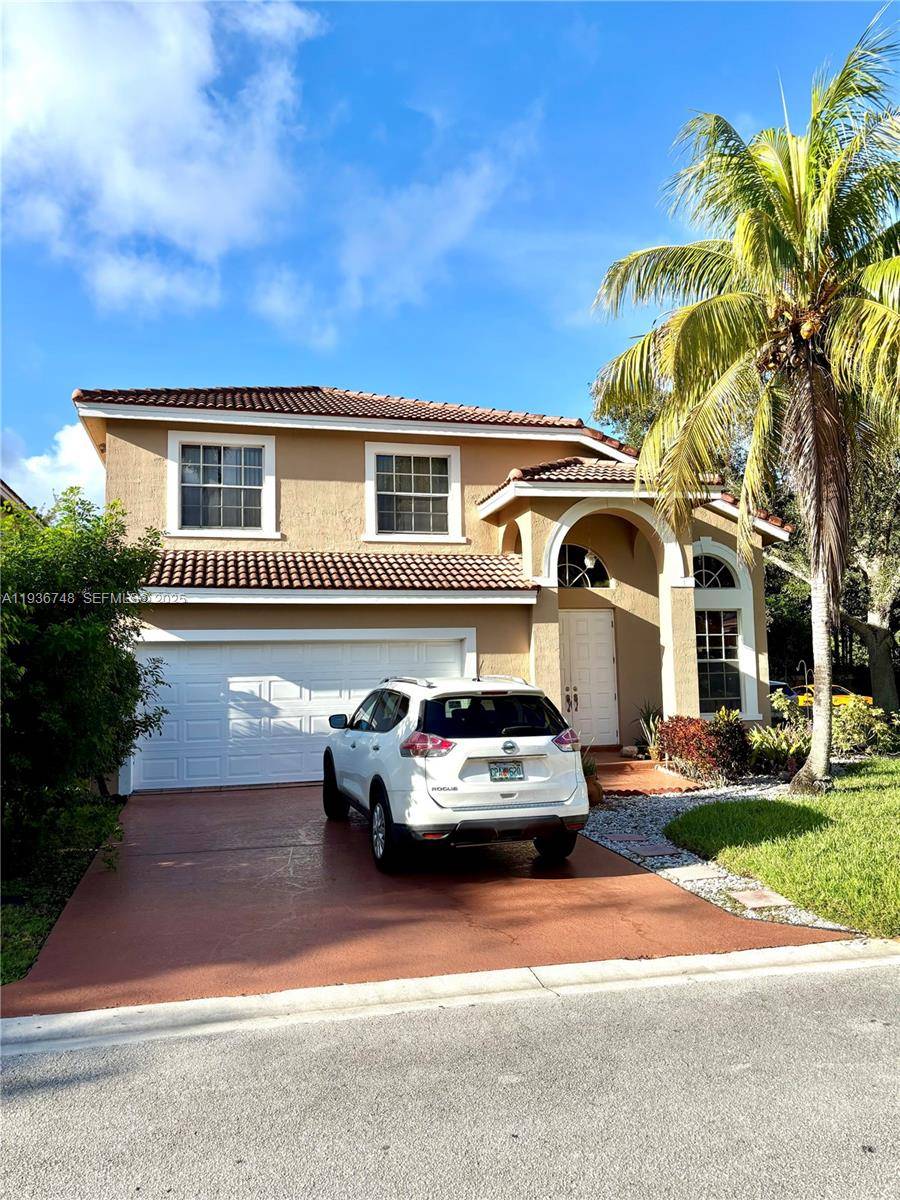 Beautiful home in Coral Springs, low HOA good schools.