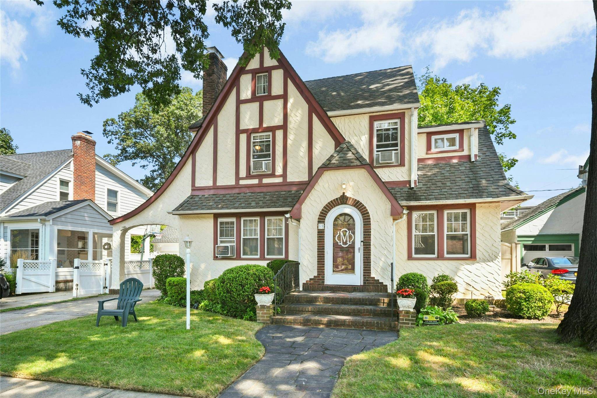 Welcome to 57 Hollywood Court, a beautifully maintained Tudor in the Harvard area of Rockville Centre !