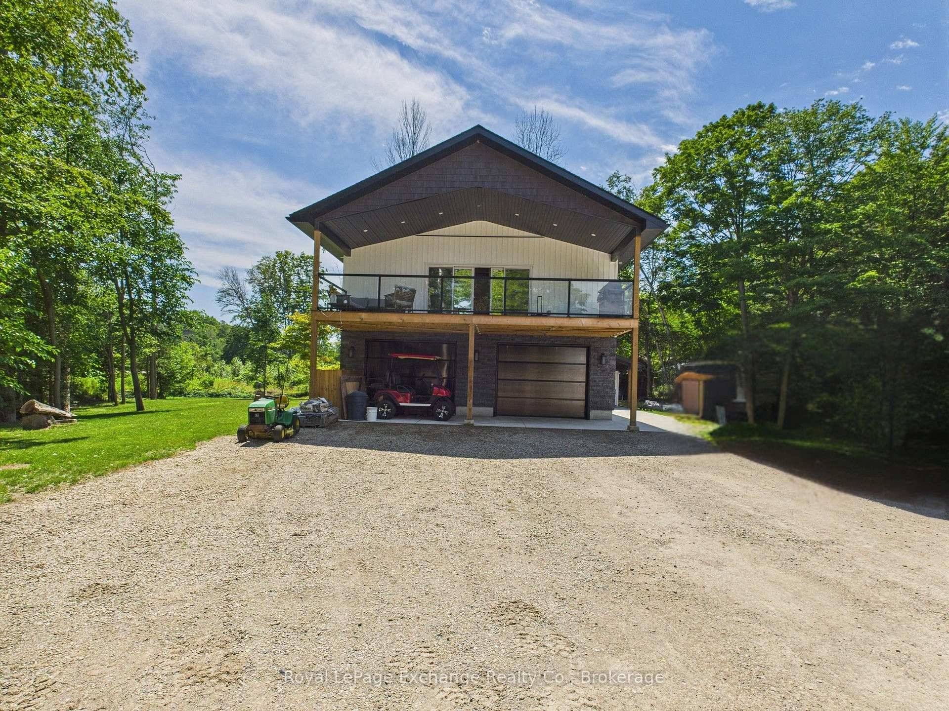 Welcome to 127 Hemlock Street in Point Clark a stunning modern chalet style home built in 2021, designed for comfort, style, and convenience.