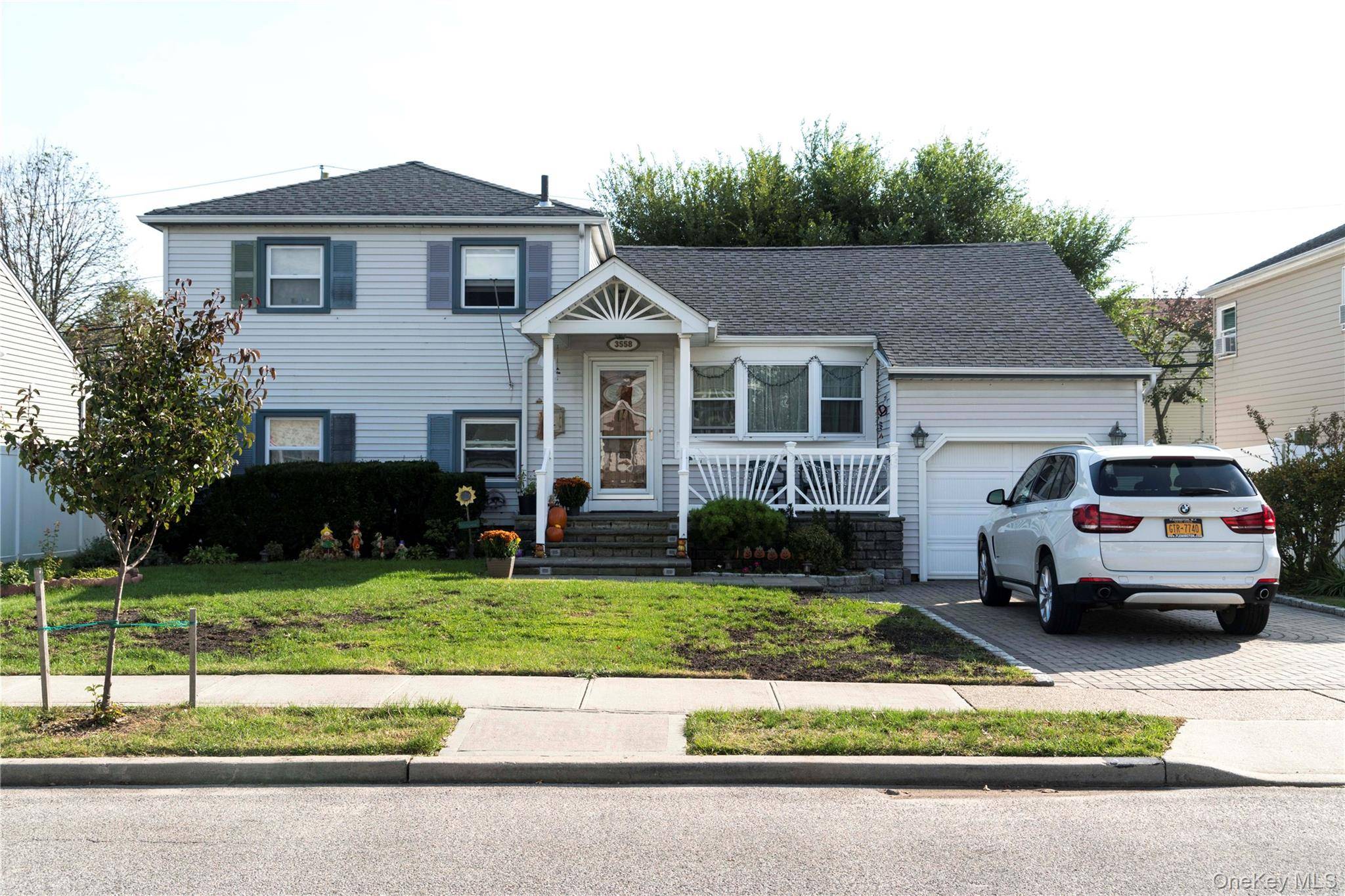 mid block, pristinely maintained split house renovated kitchen with wolf range.