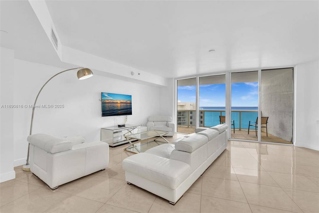 Experience oceanfront luxury at its finest in this stunning FURNISHED 2 bedroom plus den residence at Ocean Four.