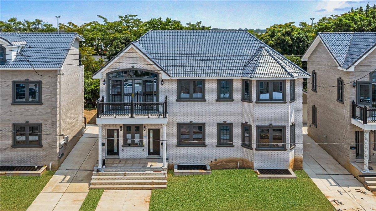 Step into luxury living with this stunning, newly built 2 story brick home that perfectly balances modern elegance and everyday comfort.