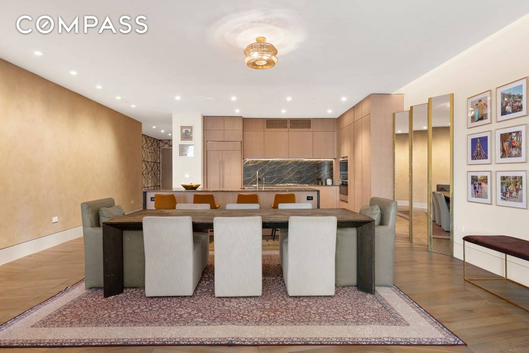 Welcome to 49 Chambers Street, Residence 8E an extraordinary corner home offering three spacious bedrooms plus a study, three en suite baths, and a refined powder room.