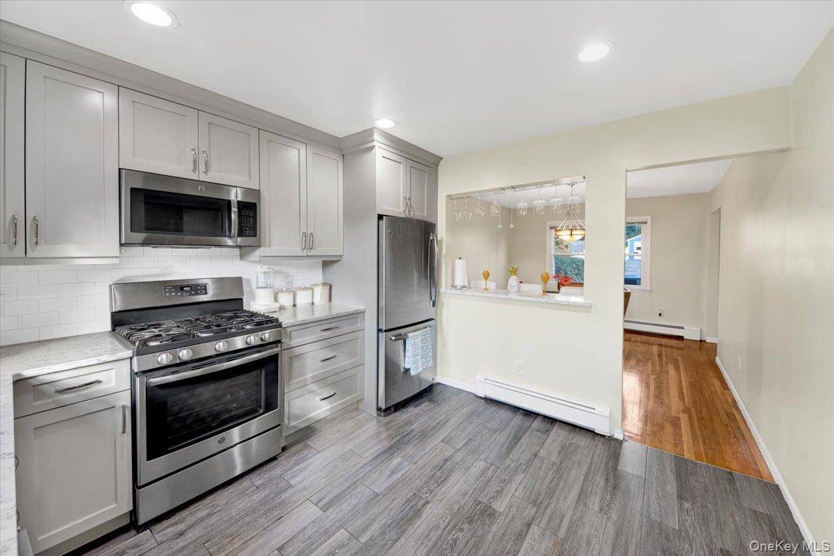 Large updated Bronxville PO center hall colonial featuring 4 bedrooms, 2 full bath's and 1 half bath.